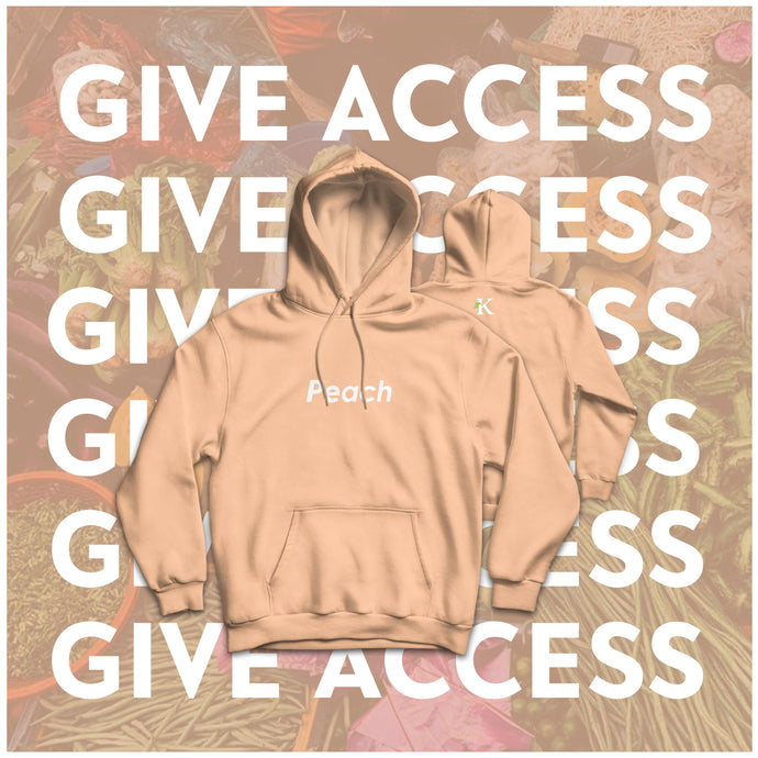 The Kanbe's Markets Produce Hoodie in Peach. It is a light pink hoodie that says peach on the front.